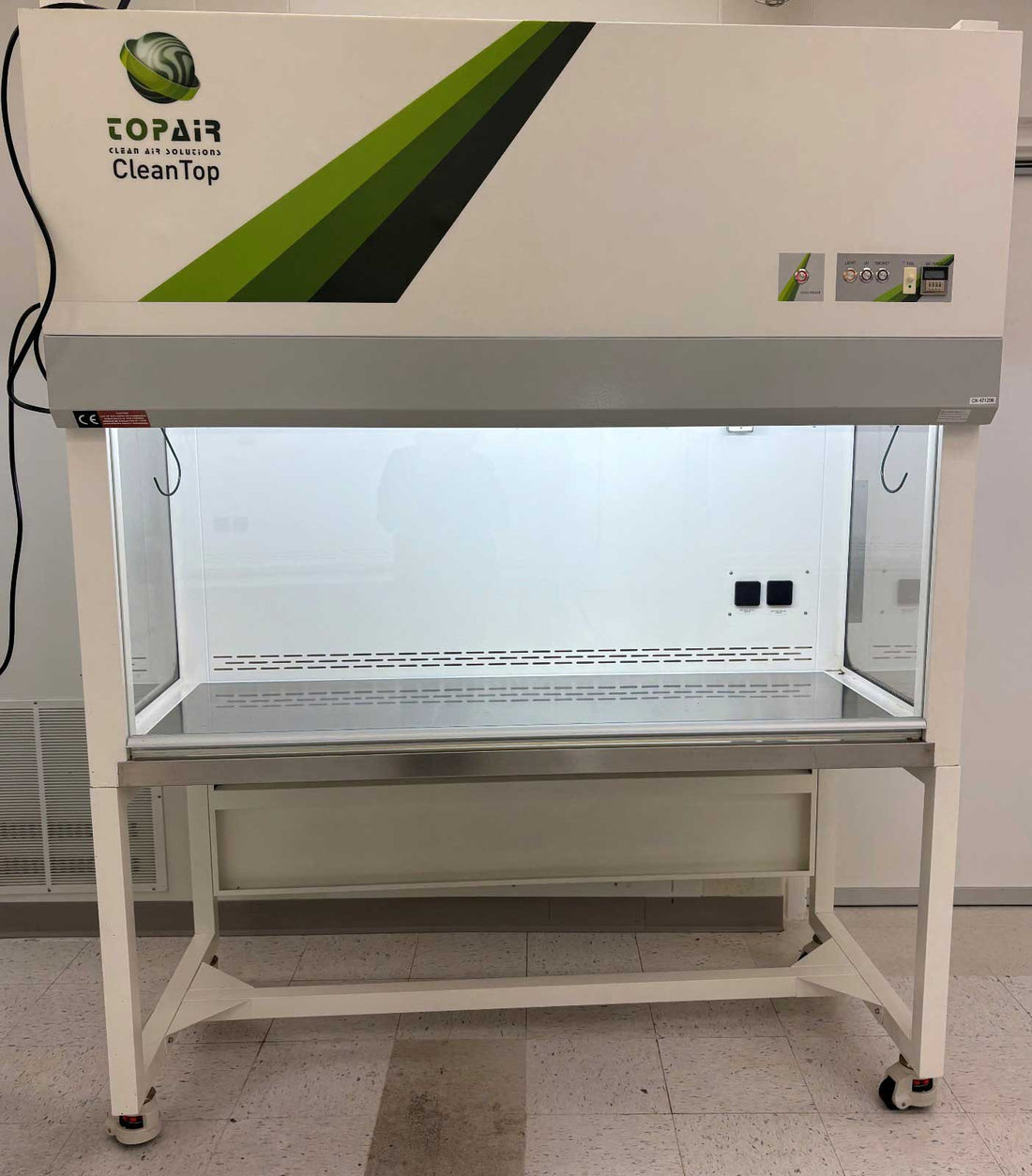 Topair CleanTop laboratory fume hood with a green and black logo on a white background.