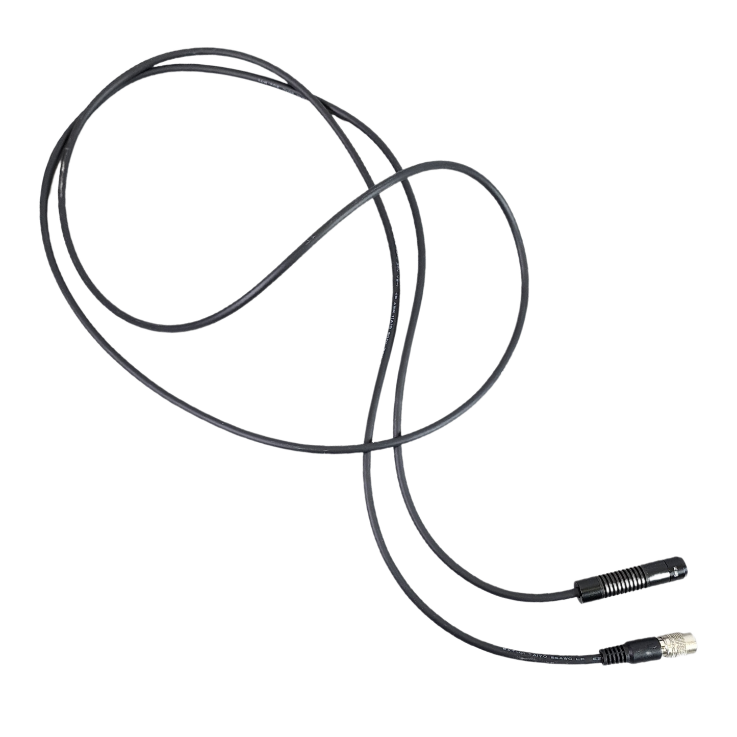 Coiled black cable with connectors on a white background