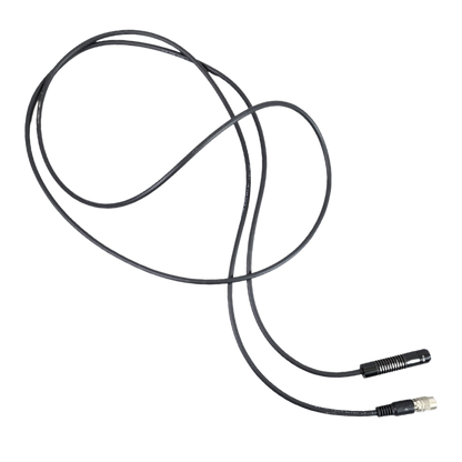 Coiled black cable with connectors on a white background