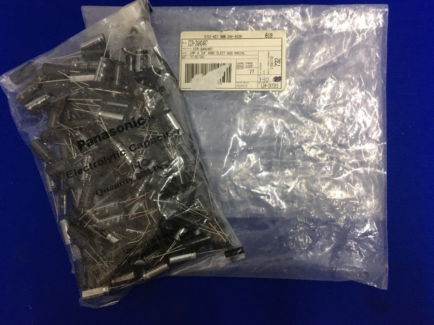 1 PKG CONTAINING 140 - PANASONIC/DIGI-KEY ECA-2WHG4R7 ELECTROLYTIC CAPACITORS