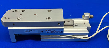 PRESSE À COULISSEAU DE TABLE SMC MXS16-50